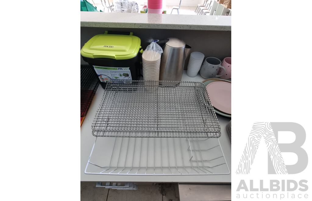 Assorted Kitchenware Including Cooling Racks, Metal Trays, Plastic Chopping Boards and More