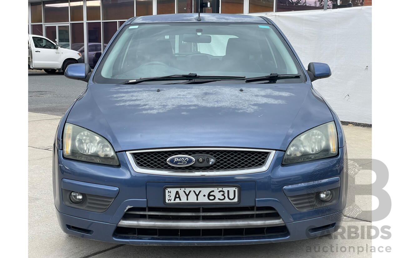 07/06 Ford Focus ZETEC FWD LS 5D Hatchback Blue 2.0L