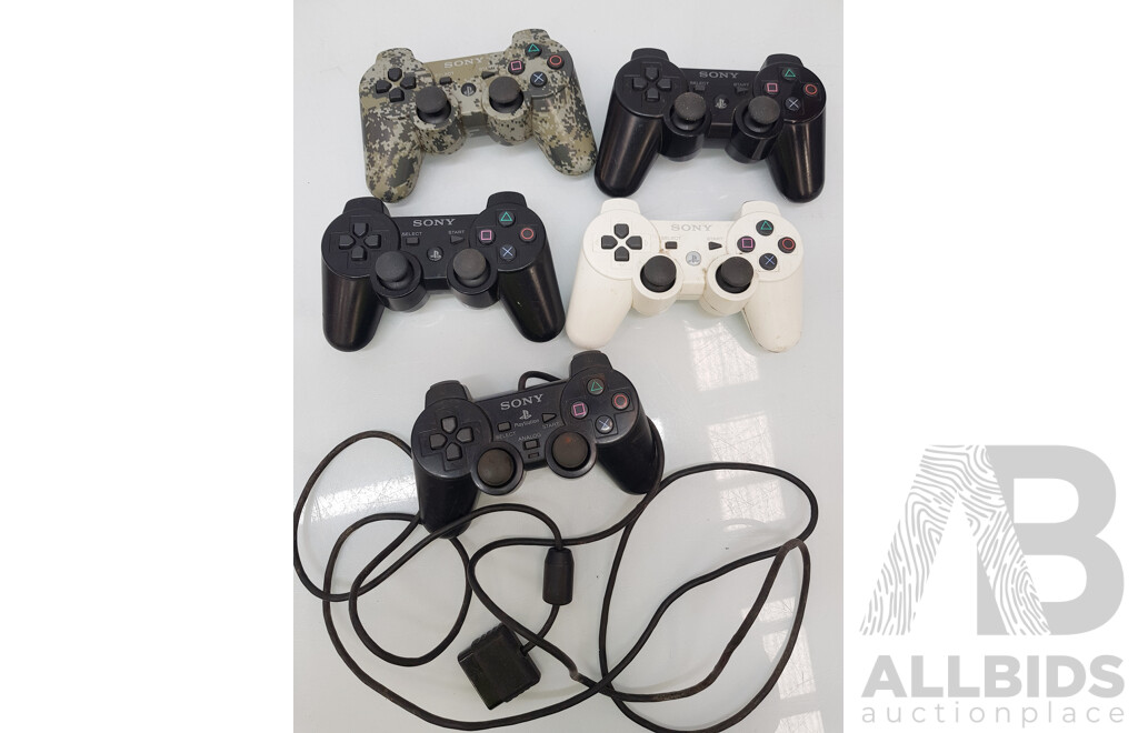 Nintendo (RVL-001 AUS) Wii Consoles and Assorted PlayStation Controllers