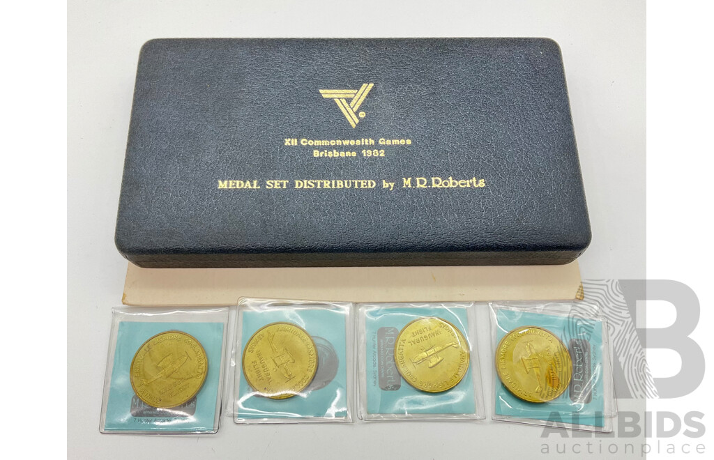 Australian 1982 Commonwealth Games M.R Roberts Medal Set with Four 1982 Great Australian Air Race Medallions (4)