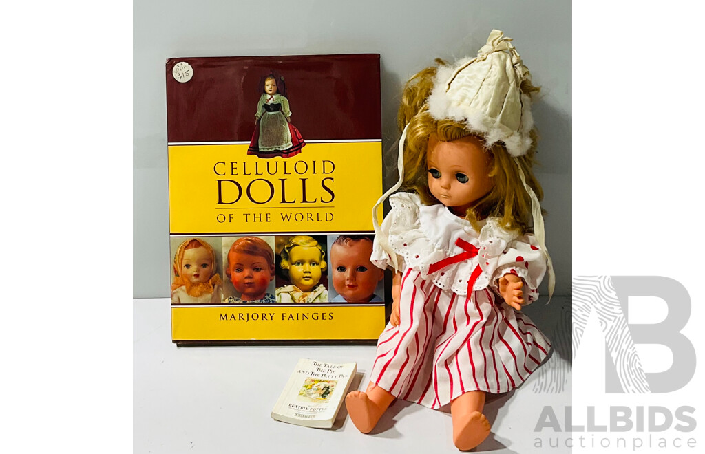 Vintage Doll with Bonnet and Celluloid Dolls of the World by Marjory Fainges, Alongside a Mini Beatrix Potter Book