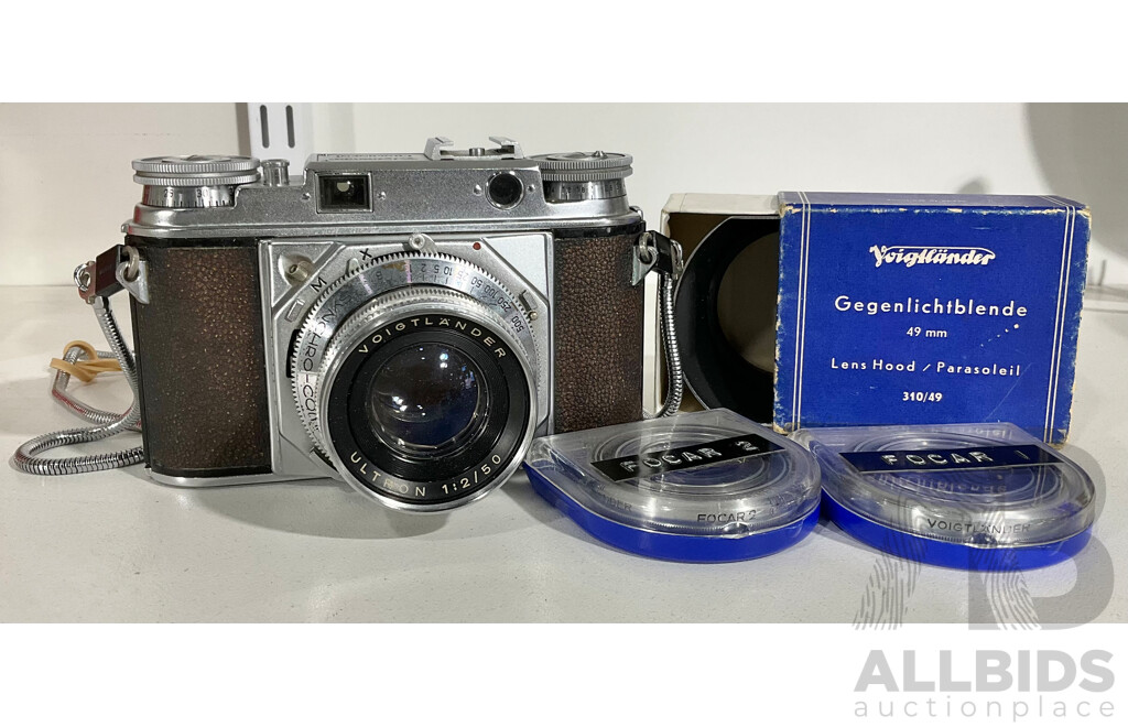 Voiglander Prominent SLR Camera with Ultron 50mm F2 and Focar Filters