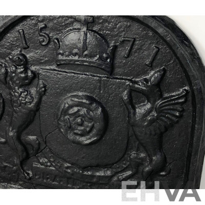 Late 19th Century Cast Iron English Fire Place Back with Coat of Arms, Wyvern and a Lion Supporting a Shield Centred by a Rose