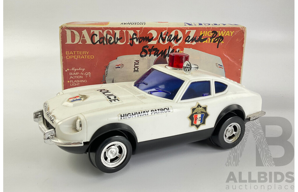 Vintage Datsun 260 Z Highway Patrol Battery Operated Bump and Go with Original Packaging