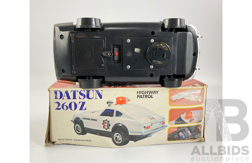 Vintage Datsun 260 Z Highway Patrol Battery Operated Bump and Go with Original Packaging