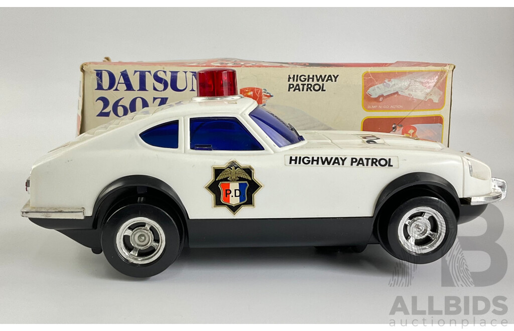 Vintage Datsun 260 Z Highway Patrol Battery Operated Bump and Go with Original Packaging