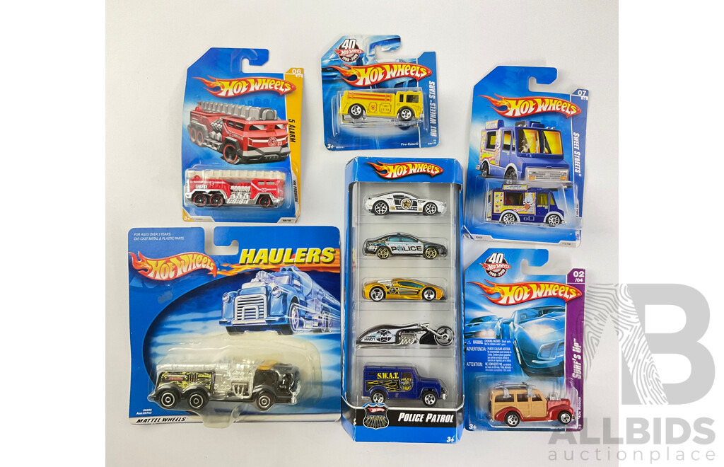 Collection of Boxed Hot Wheels Including Police Patrol Five Pack, Haulers Fire Truck, 5 Alarm, Fire Eater and Sweet Streets, Surf’s Up