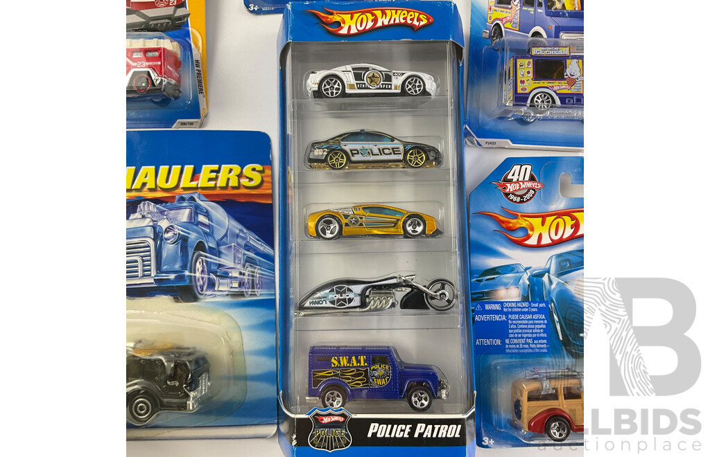 Collection of Boxed Hot Wheels Including Police Patrol Five Pack, Haulers Fire Truck, 5 Alarm, Fire Eater and Sweet Streets, Surf’s Up