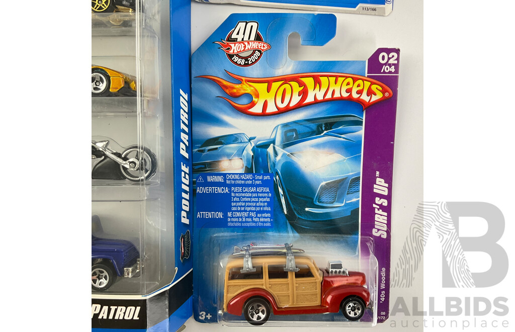 Collection of Boxed Hot Wheels Including Police Patrol Five Pack, Haulers Fire Truck, 5 Alarm, Fire Eater and Sweet Streets, Surf’s Up