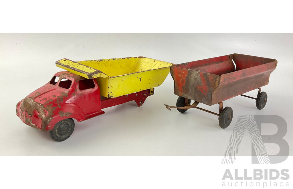 Vintage Pressed Steel Dump Truck and 1960's Ertl Harvester Trailer