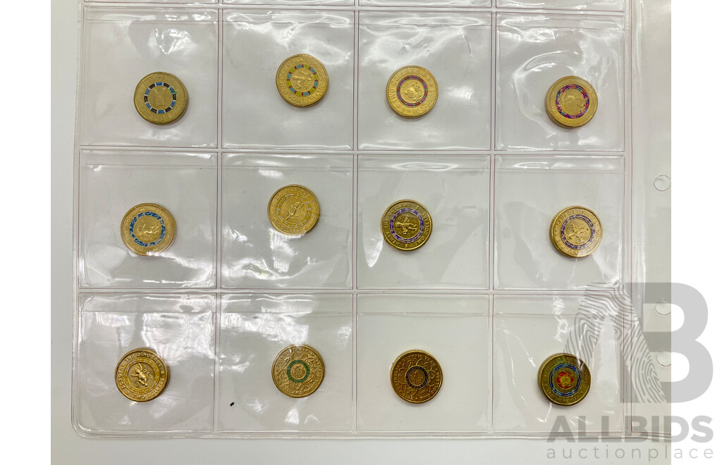 Twenty Australian Commemorative Two Dollar Coins Including 2015 Lest We Forget, 2022 Commonwealth Games 'A' 'U' 'S' 2021 Ambulance Service, 2019 Mr Squiggle, Blackboard, Gus, 2021 Henry the Octopus, Wags the Dog, Dorothy the Dinosaur and More