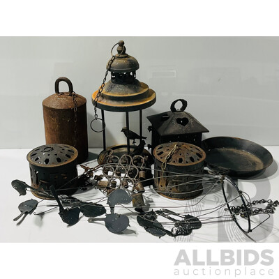 Collection of Vintage Outdoor Hangers Including Cast Iron Candle Holders, Cow Bell, Bird Feeder and Wind Chimes