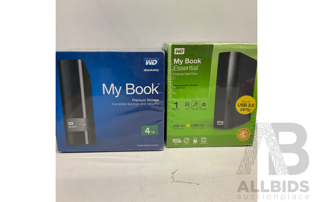 WD My Book Premium Storage 4TB & Essential External Hard Drive 1TB - Lot of 2 - Estimated Total ORP $500.00