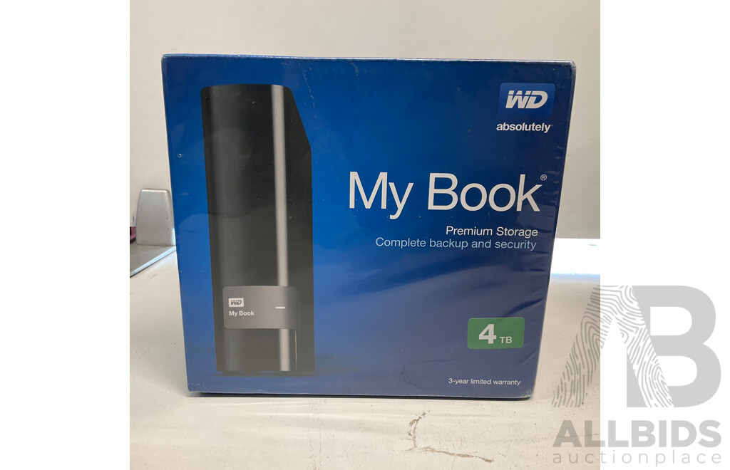 WD My Book Premium Storage 4TB & Essential External Hard Drive 1TB - Lot of 2 - Estimated Total ORP $500.00