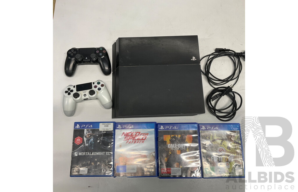 PS4 Console & 2x Controllers & 4x PS4 Games