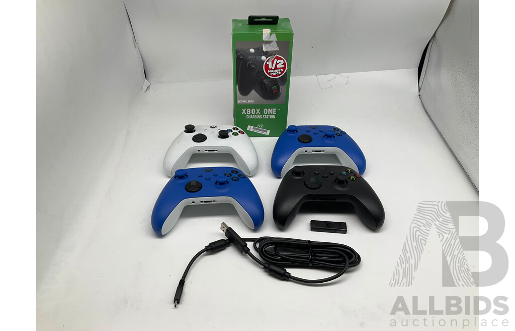 XBOX Wireless Controllers (Lot of 4) W/ XBOX One Charging Station, Wireless Adapter and Charging Cable  - ORP: $416.00