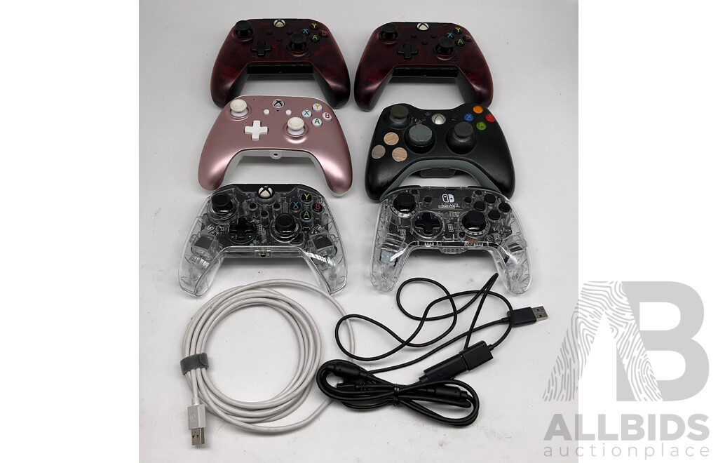 Assortment of Controllers Including Xbox One, Nintendo Switch and Xbox 360 (Lot of 6) W/ 2 Charger Cables - ORP: $312.95