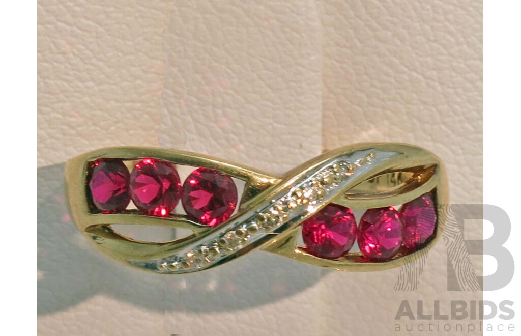 9ct Gold Ruby & Diamond cross-over style ring