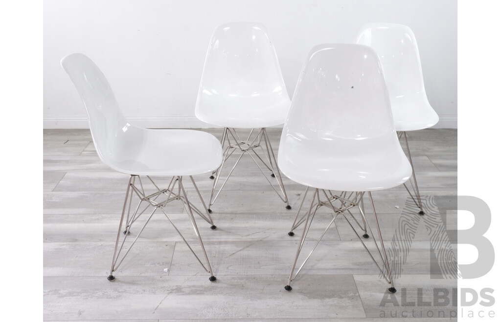 Four Replica Eames Moulded Plastic Chairs