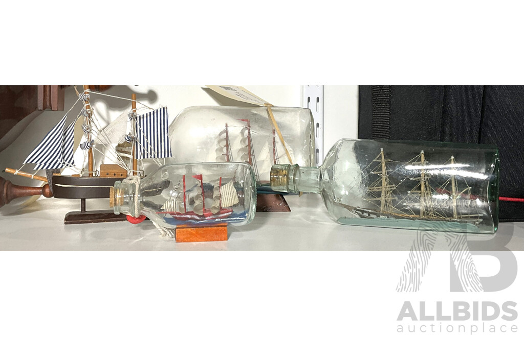 Three Ship in a Bottle and and One Small Timber Ship Model