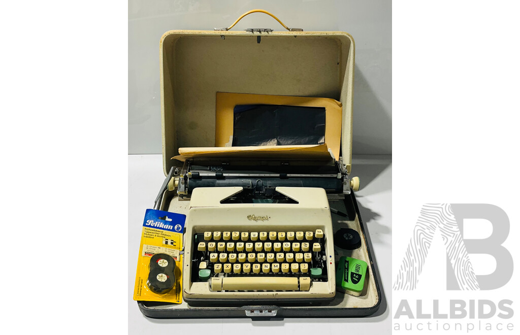 Vintage Olympic Typewriter in Original Carry Case Alongside Extra Ribbon and Copy Paper