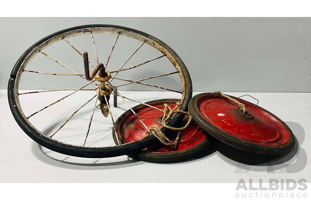 Trio of Vintage Wheels Including Bicycle Wheel with Pedals