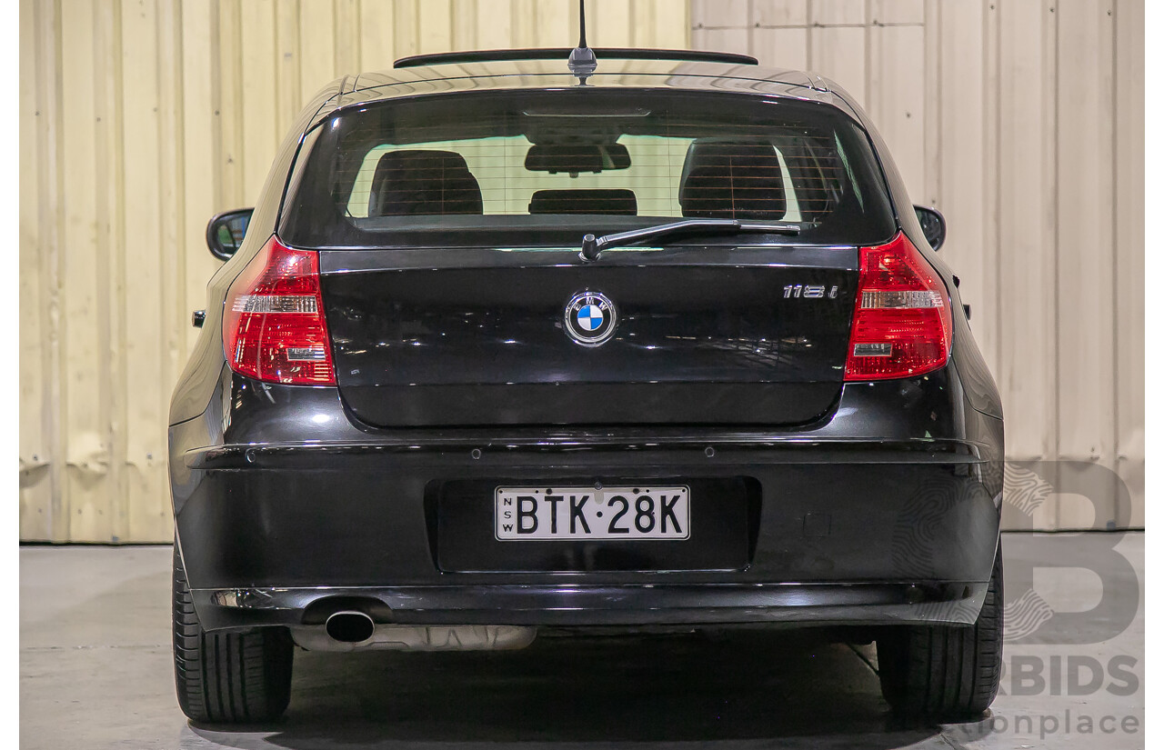 6/2010 BMW 118i E87 MY10 5d Hatchback Black 2.0L