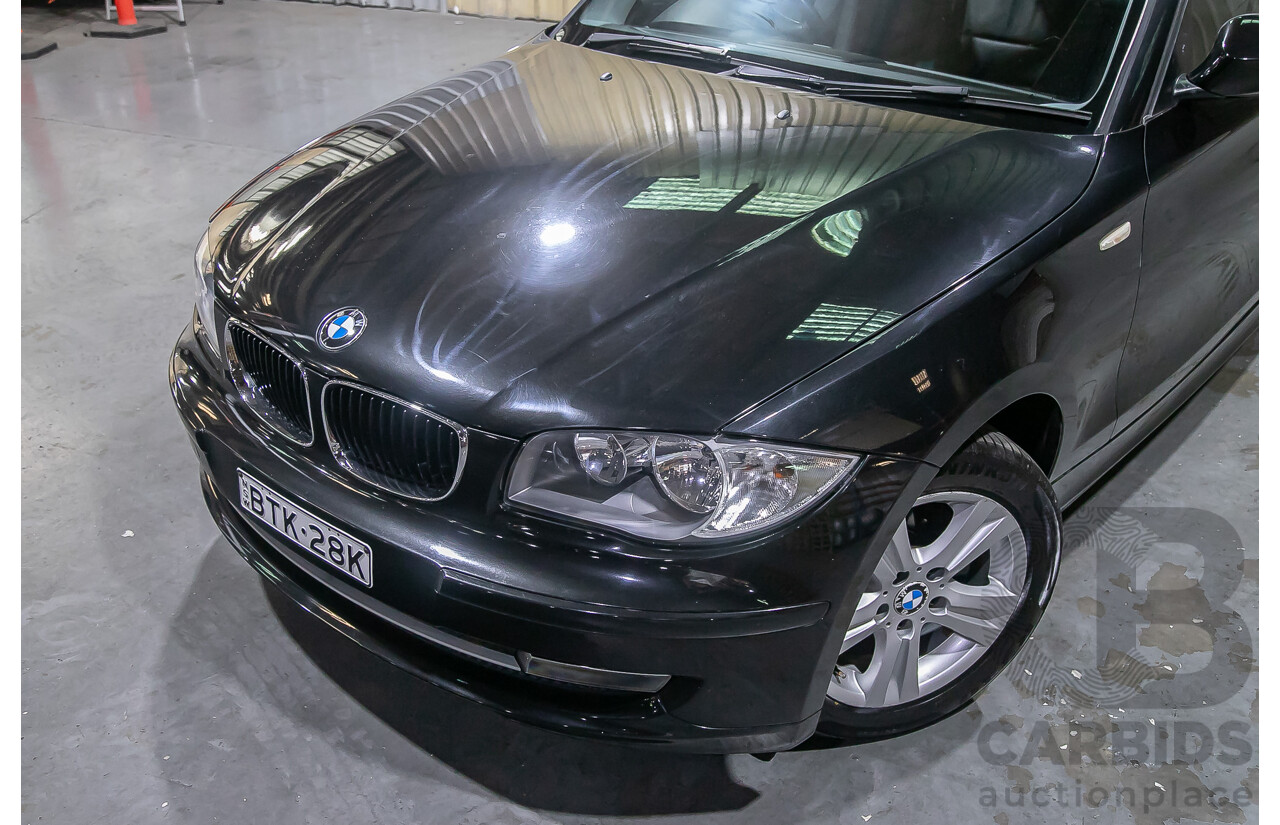 6/2010 BMW 118i E87 MY10 5d Hatchback Black 2.0L