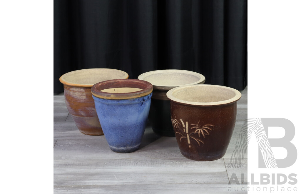 Set of Four Ceramic Pots