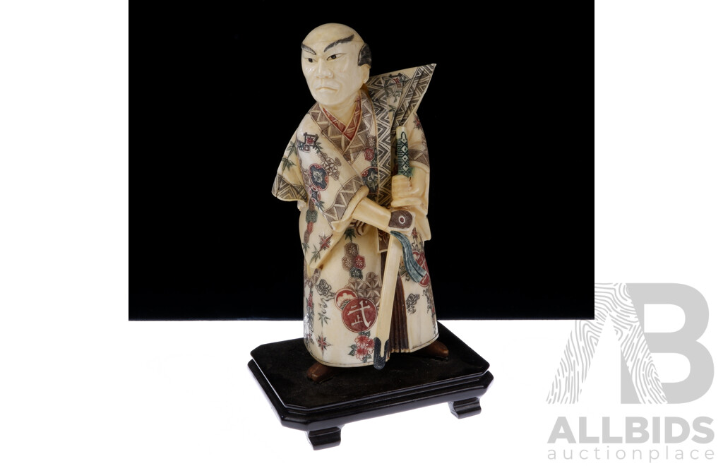 Vintage Asian Carved and Dyed Bone Samurai Statue on Wooden Stand