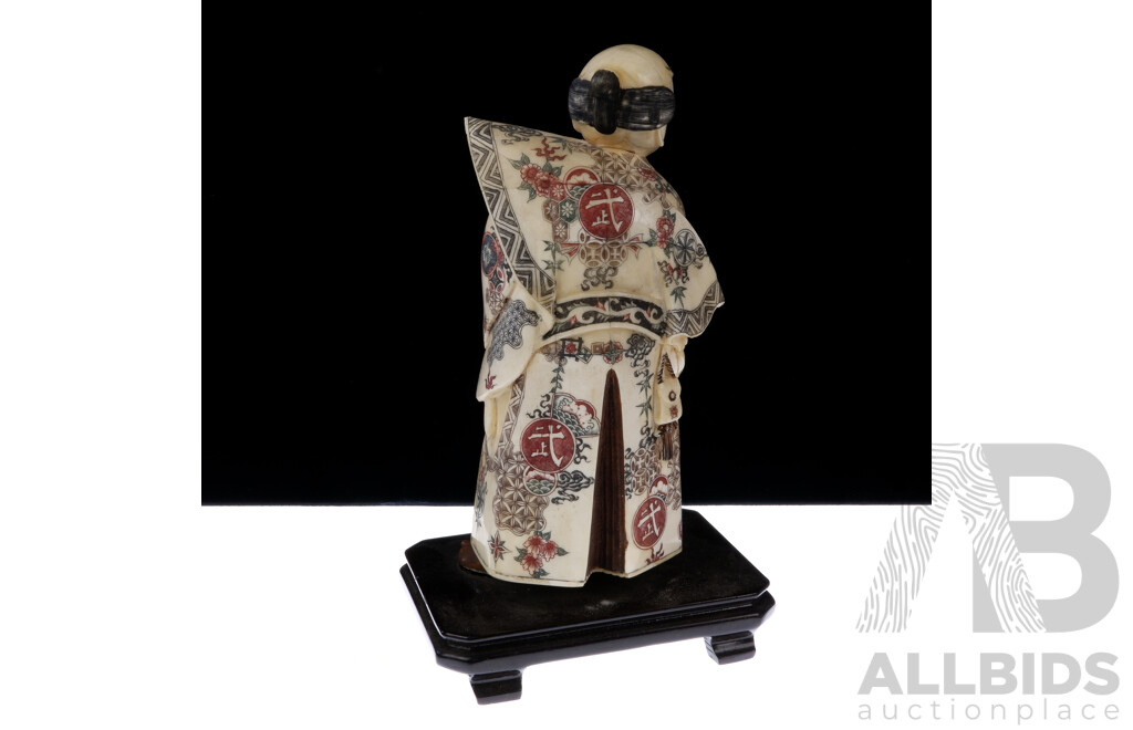 Vintage Asian Carved and Dyed Bone Samurai Statue on Wooden Stand