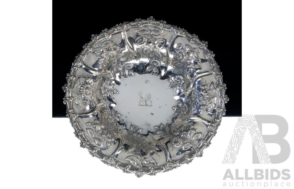 Antique Sterling Silver George IV Centerpiece Bowl with Repoussé Floral Detail and Merlion with Axe Engraved Crest to Interior, London, 1891