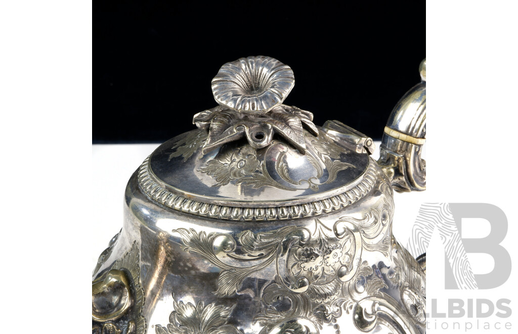 Antique Sterling Silver Teapot with Heavily Repoussed Detail with Engraved Canine Crest, Ivory Heat Spacers and Flower Form Finial, Sheffield, Probably 1899