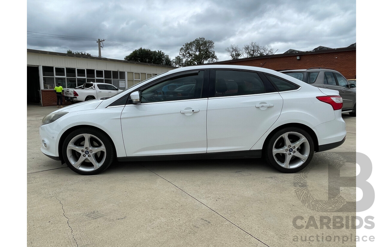 08/11 Ford Focus TITANIUM FWD LW 4D Sedan White 2.0L