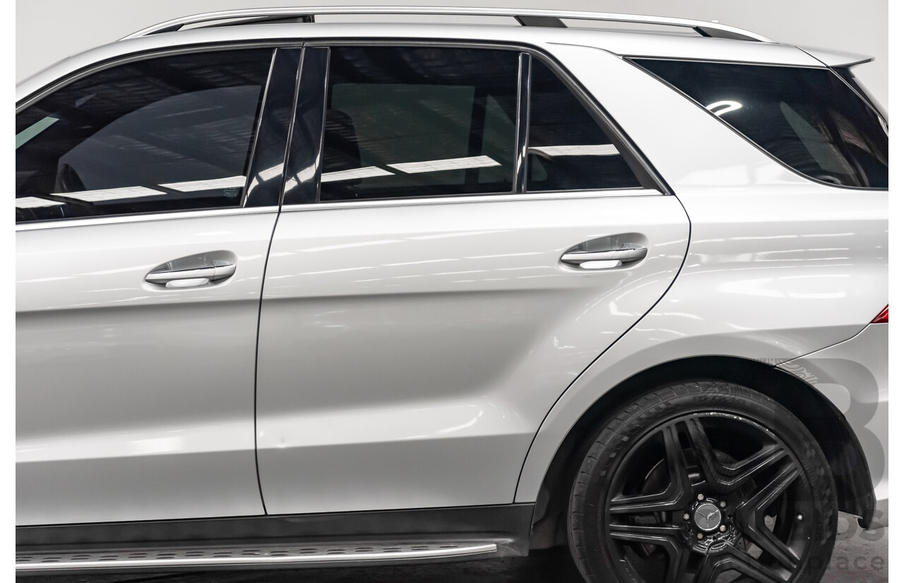 1/2014 Mercedes Benz ML 63 AMG (4x4) 166 MY14 4d Wagon Iridium Silver Metallic Twin Turbo V8 5.5L