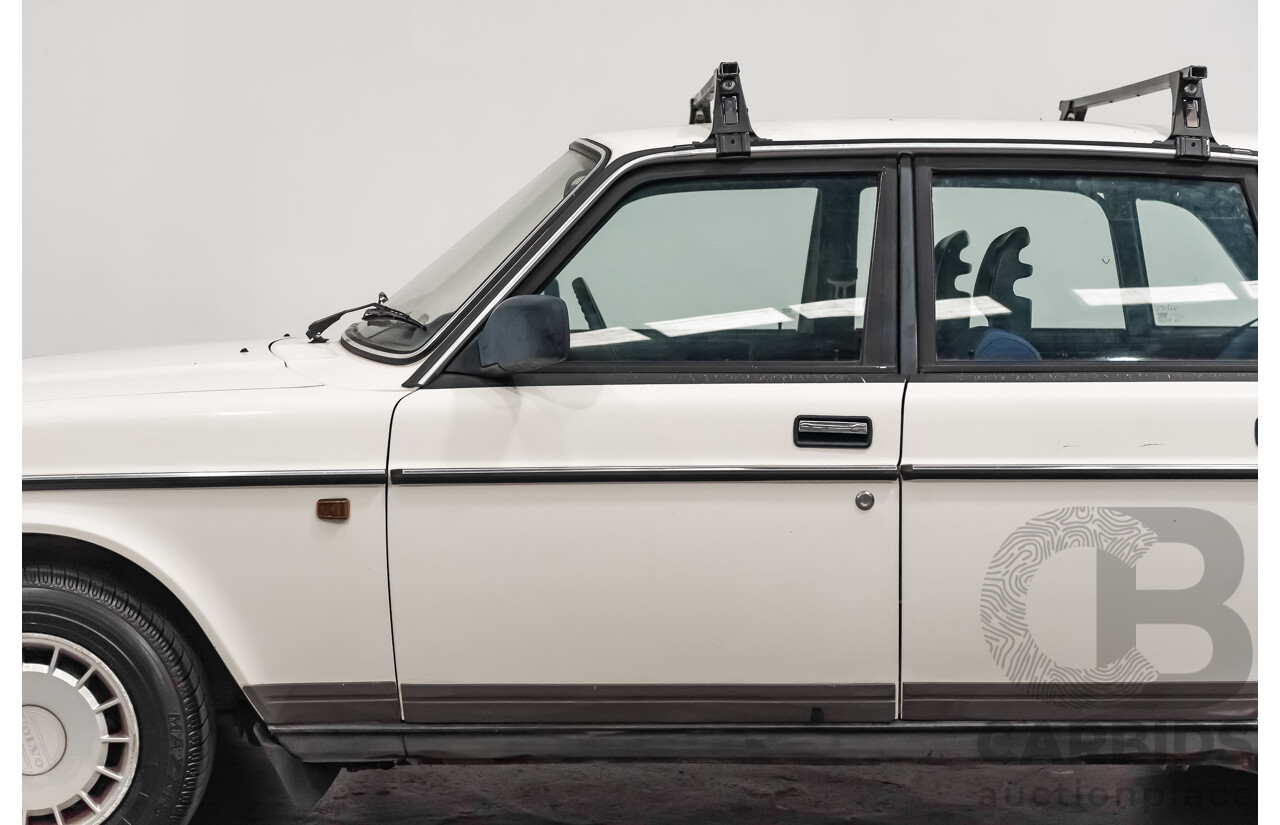 9/1990 Volvo 240 GL  4d Sedan White 2.3L