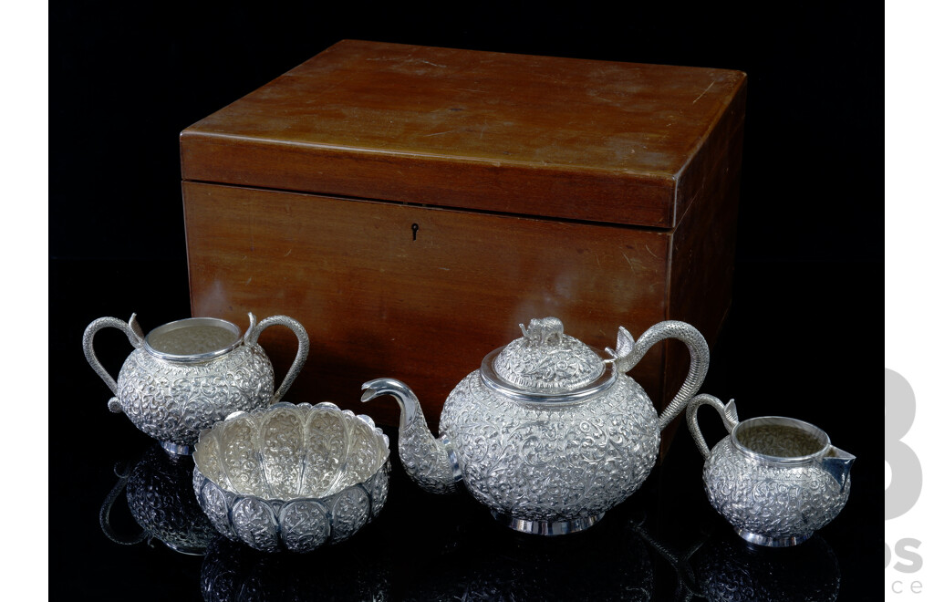 Fantastic Sterling Silver Heavily Repoussed Indian Tea Set Comprising Teapot with Cobra Motif Handle & Elephant Finial, Twin Handled Sugar Bowl, Creamer and Bowl, All Contained in Antique Mahogany Box