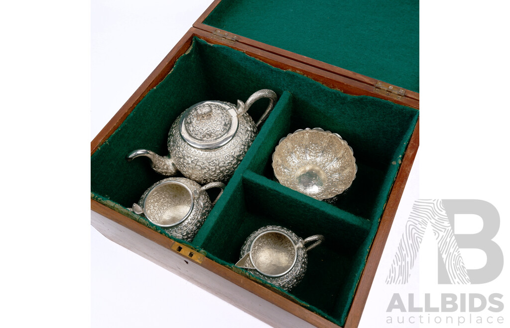 Fantastic Sterling Silver Heavily Repoussed Indian Tea Set Comprising Teapot with Cobra Motif Handle & Elephant Finial, Twin Handled Sugar Bowl, Creamer and Bowl, All Contained in Antique Mahogany Box