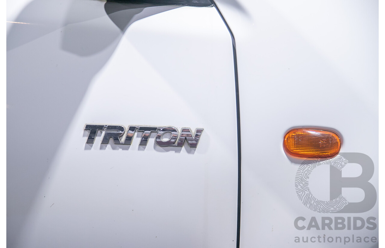 6/2009 Mitsubishi Triton GLX ML MY09 Utility White Turbo Diesel 2.5L