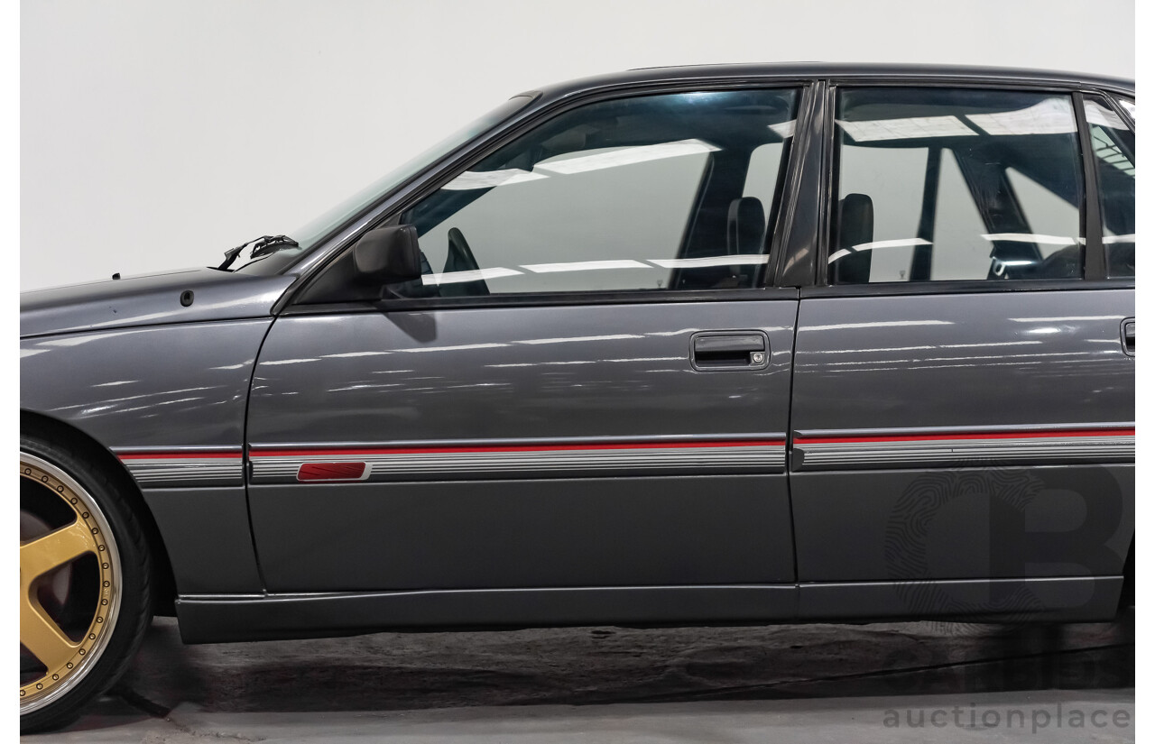 3/1990 Holden Commodore SS VN 4d Sedan A9F Atlas Grey V8 5.0L