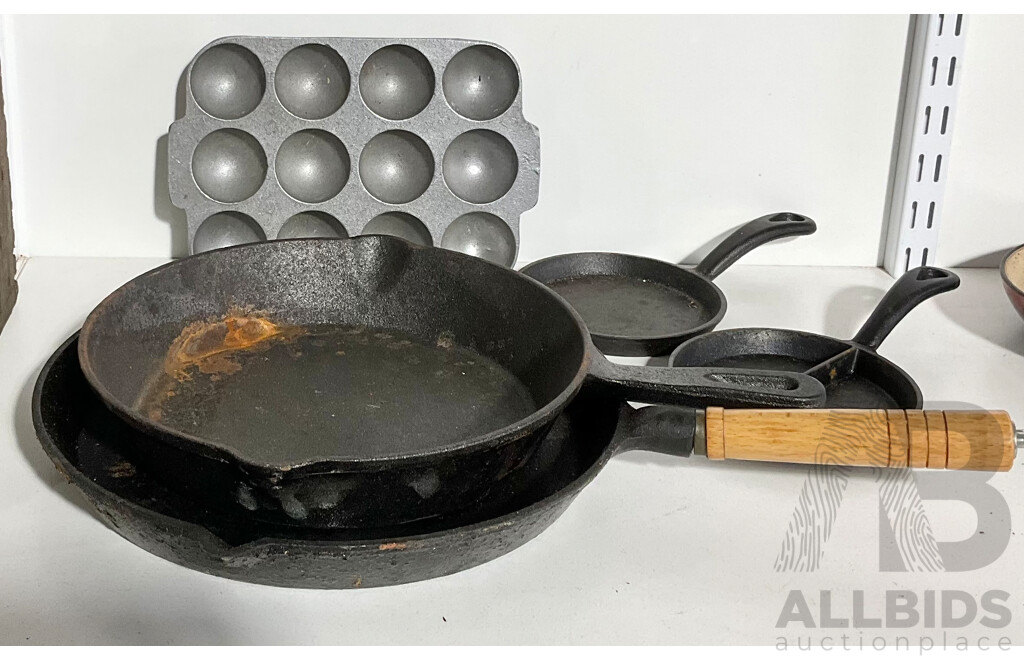 Four Cast Iron Pans and Gem Irons