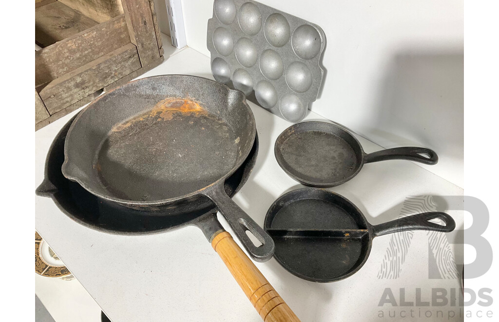 Four Cast Iron Pans and Gem Irons