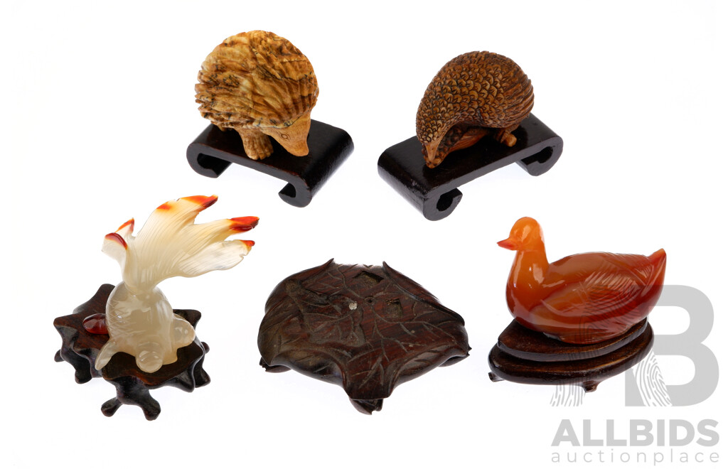 Collection Carved Asian Figures Comprising Agate Goldfish, Agate Duck Both on Wooden Stands, Stone Hedgehog, Tagua Nut Bird Along with Another Carved Wooden Stand with Fruit Footed Detail