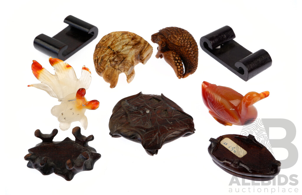 Collection Carved Asian Figures Comprising Agate Goldfish, Agate Duck Both on Wooden Stands, Stone Hedgehog, Tagua Nut Bird Along with Another Carved Wooden Stand with Fruit Footed Detail