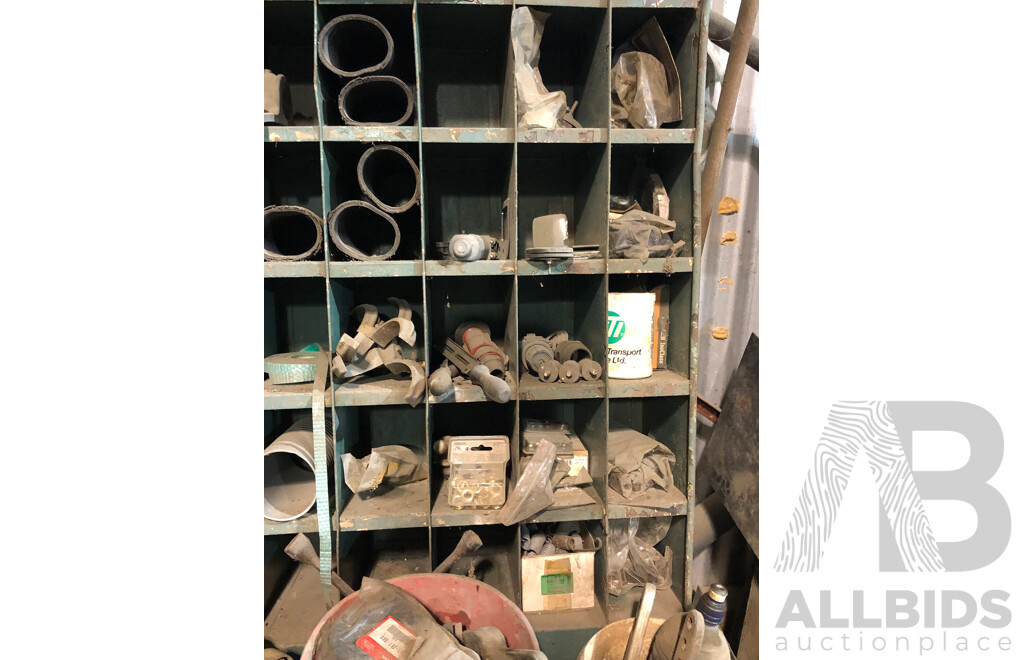 Storage Rack with Contents Above and Below Including but Not Limited to Old/New Oil Filters, Hose Rings & Miscellaneous Items