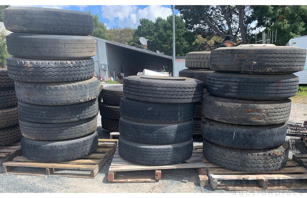 Assortment of 16 Used Truck and Trailer Tyres Some on Rims Some Not - Including Advance 11R 22.5, Hankook 11R 22.5, BridgeStone