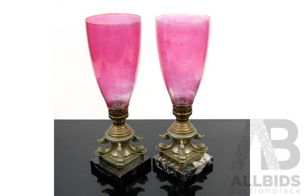 Pair Italian Antique Style Candle Holders with Brass Classical Dolphin Theme and Cranberry Style Glass Flues on Marble Bases
