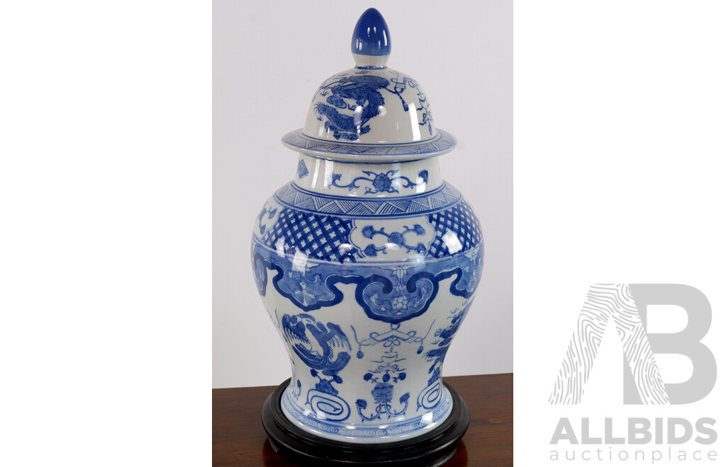 Large Chinese Blue & White Porcelain Liodded Jar with Phoenix & Dragon Design on Wooden Stand