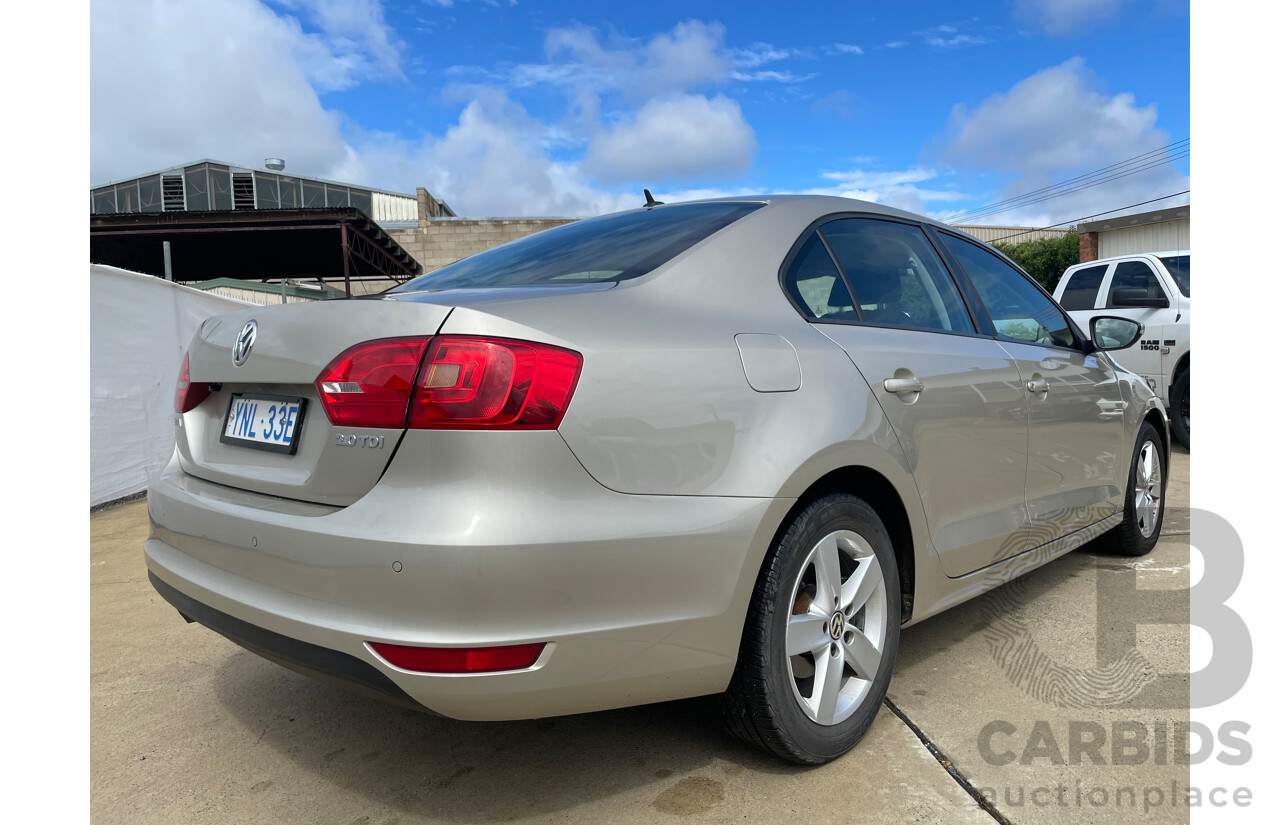 03/13 Volkswagen Jetta 103 TDI COMFORTLINE FWD 1KM MY13 4D Sedan Tan 2.0L