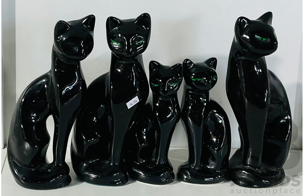 Collection of Four Ceramic Vintage Artmark Black Cats with Green Eyes Alongside One with No Painted Eyes